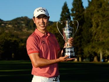 Sang-Moon Bae with the Frys.com Open trophy